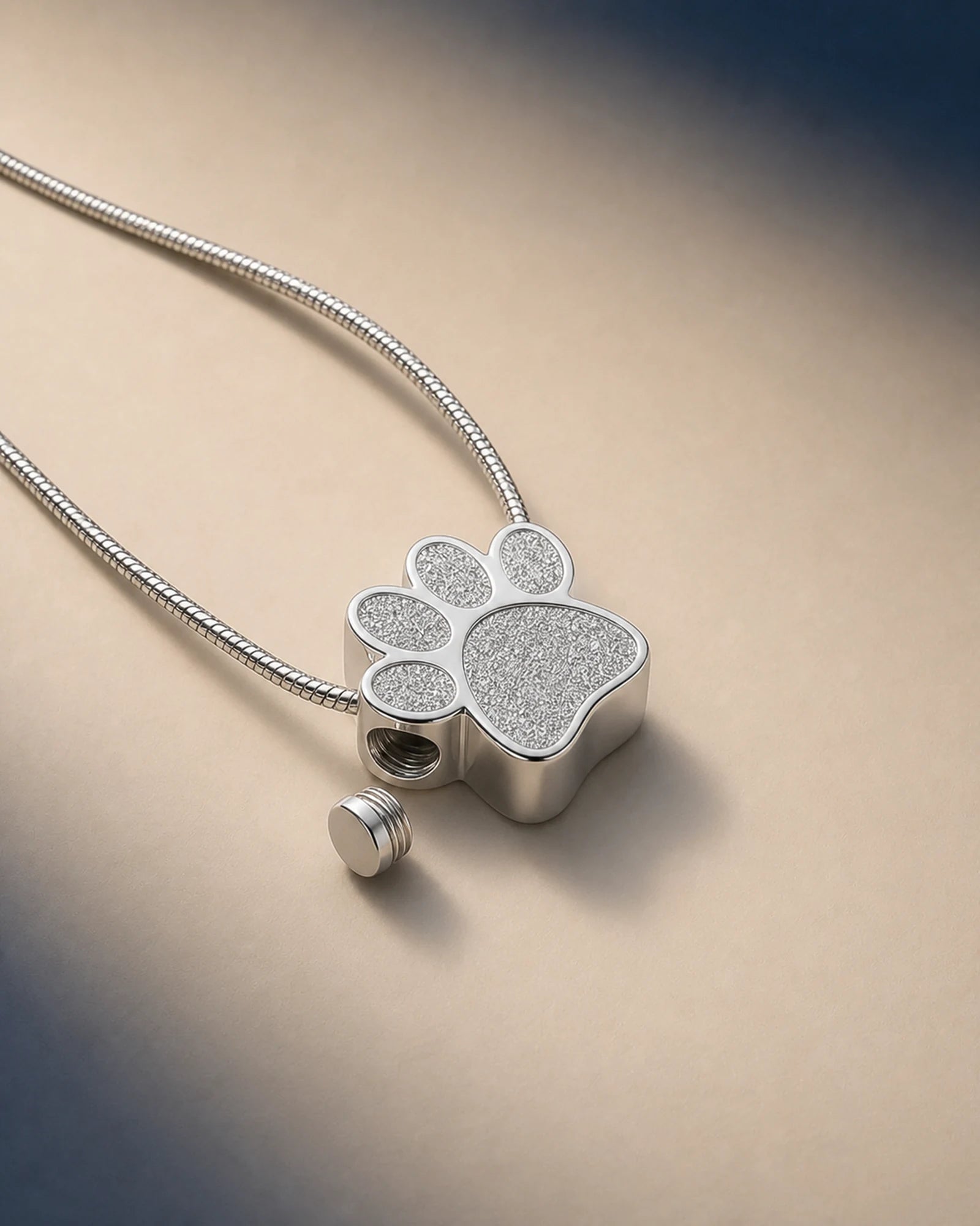Paw Square keepsake pendant with its removable side threaded plug