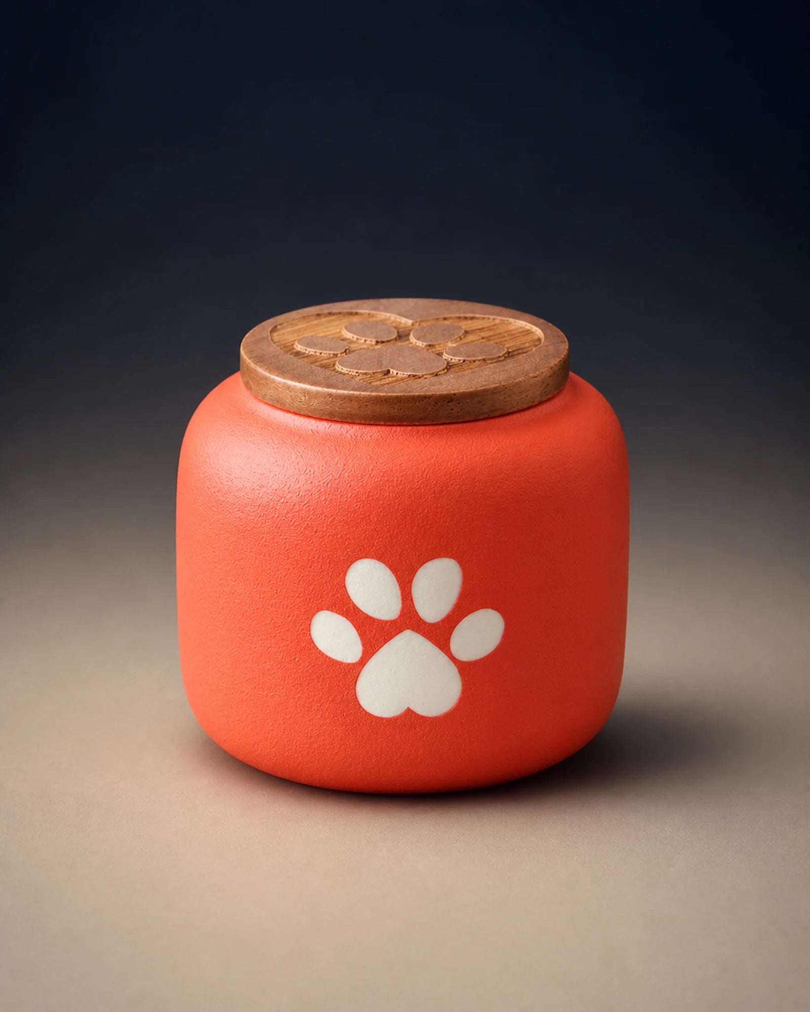 Red 180 mL pawprint memorial urn with a wooden lid