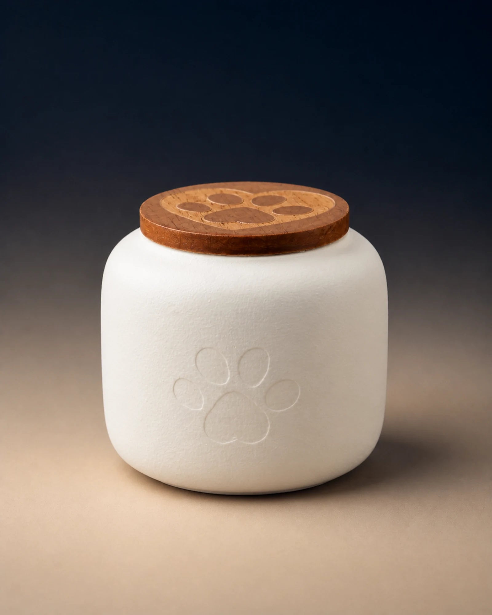 White 180 mL pawprint memorial urn with a wooden lid