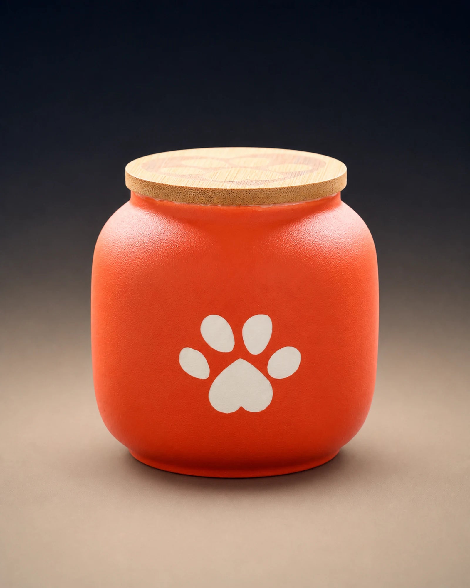 Red 500 mL pawprint memorial urn with a wooden lid