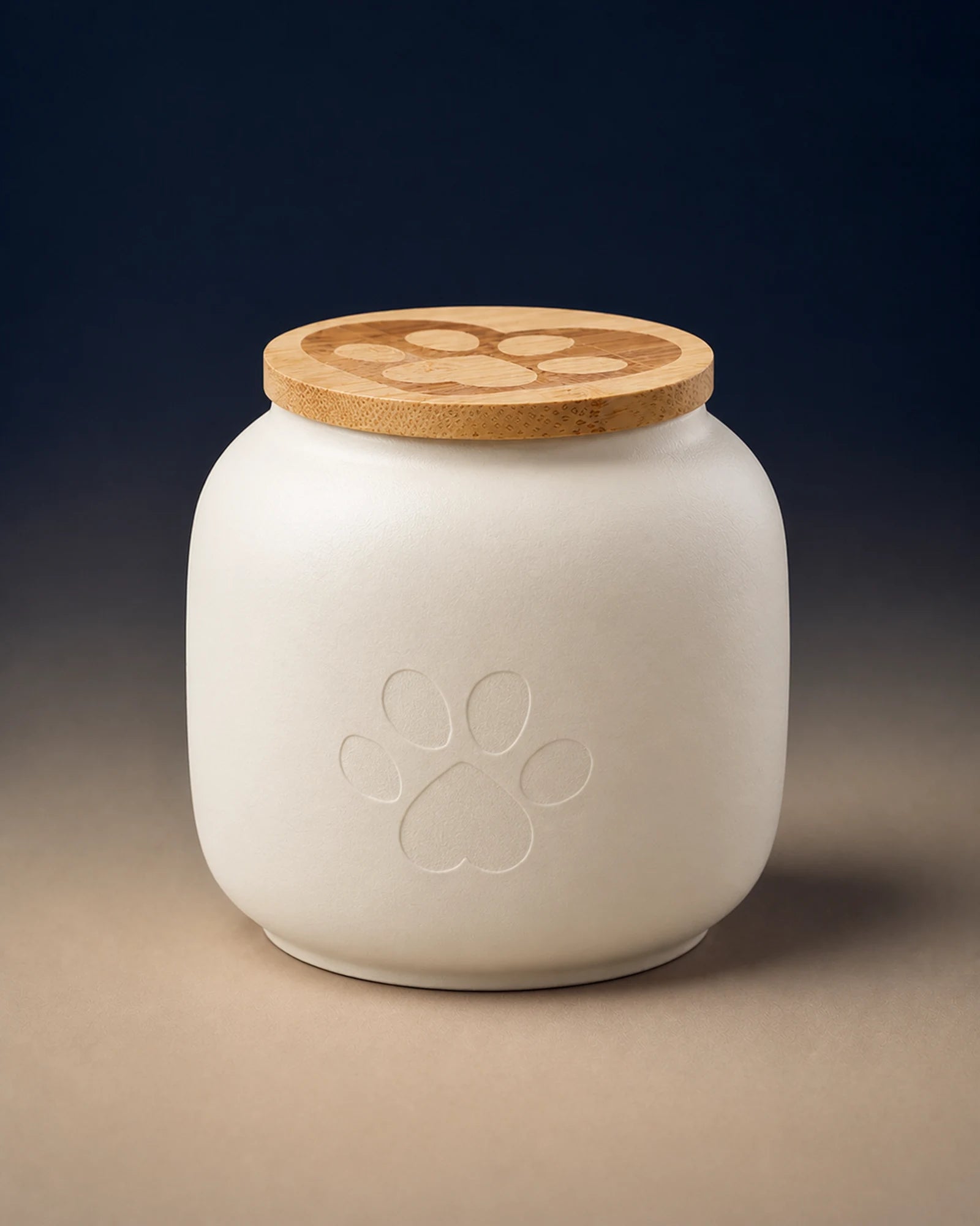 White 500 mL pawprint memorial urn with a wooden lid
