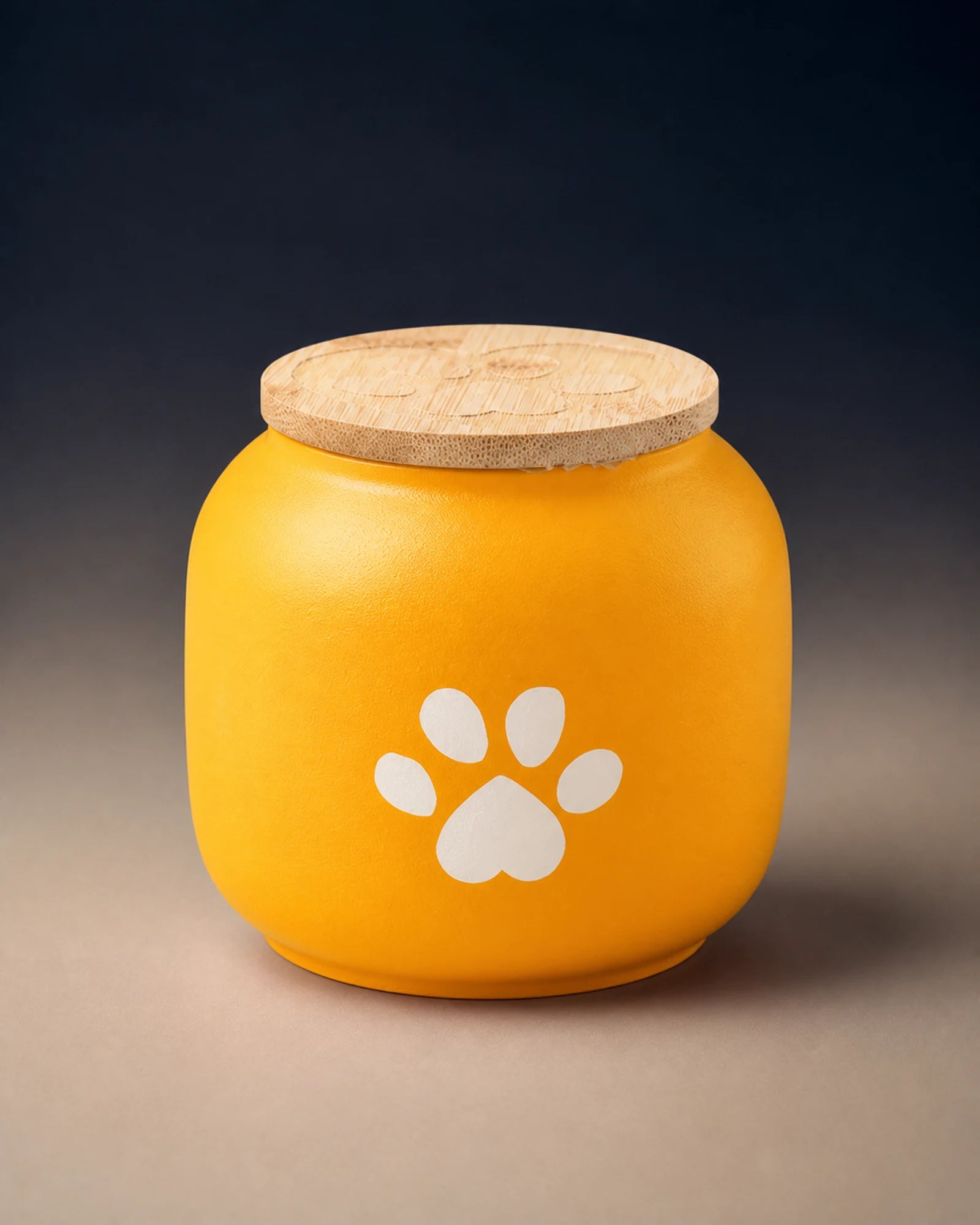 Yellow 500 mL pawprint memorial urn with a wooden lid