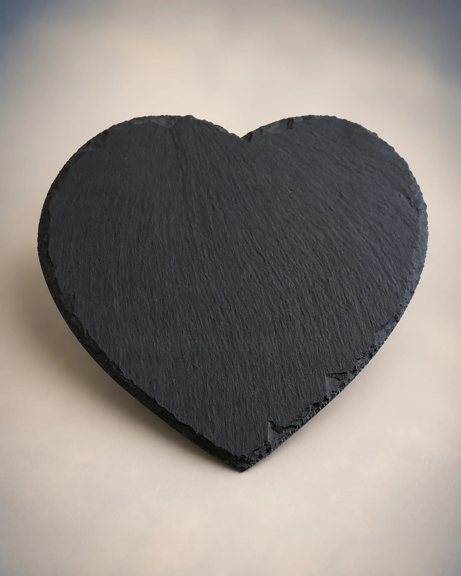 Blank heart-shaped dark slate prepared for photo personalization