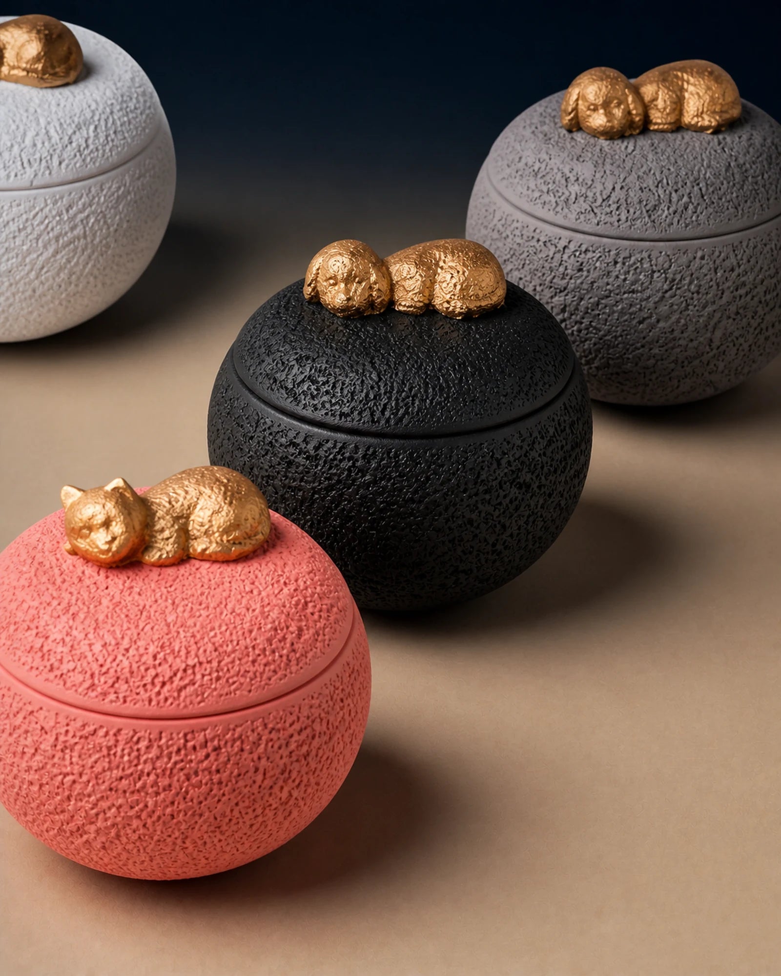 Sleeping Companion memorial urns in pink, black, gray and white
